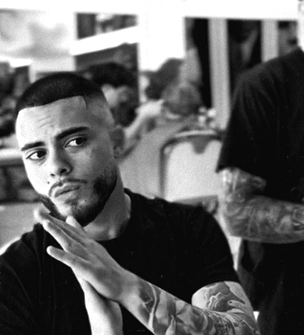Adoom, Barber at Aces Academy